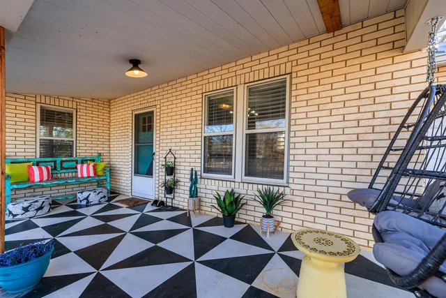 a outdoor space with patio furniture and a couch