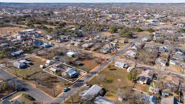 an aerial view of a city with lots of residential buildings