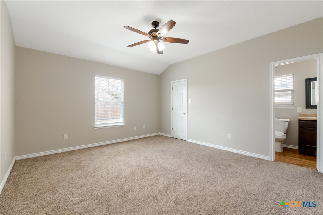 916 Freedom Drive Temple, TX 76502 - Photo 13 of 24 a view of room with window and ceiling fan