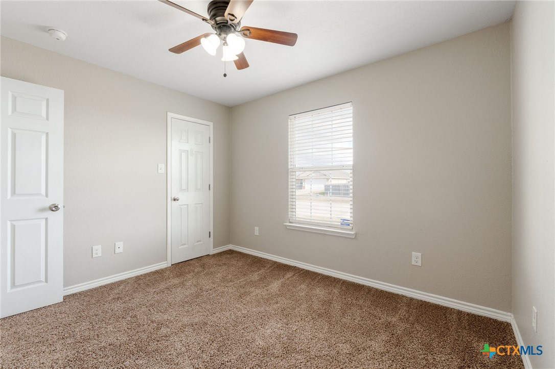 916 Freedom Drive Temple, TX 76502 - Photo 20 of 24 a view of an empty room with a window