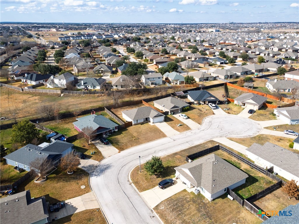 916 Freedom Drive Temple, TX 76502 - Photo 2 of 24 an aerial view of a house with a swimming pool and outdoor seating