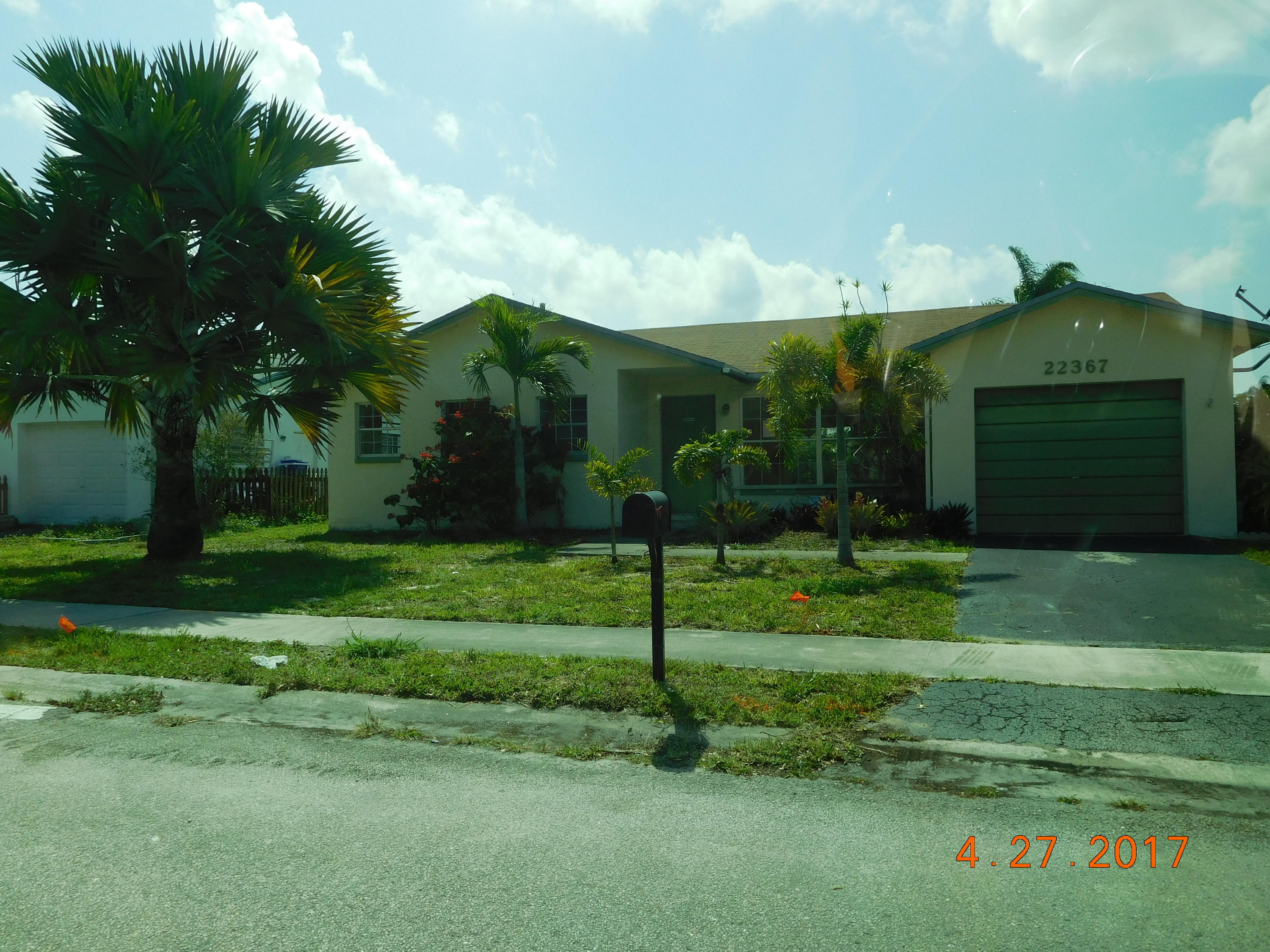 22367 Southwest 65th Avenue Boca Raton, FL 33428 - Photo 1 of 13 a view of a house front of a house