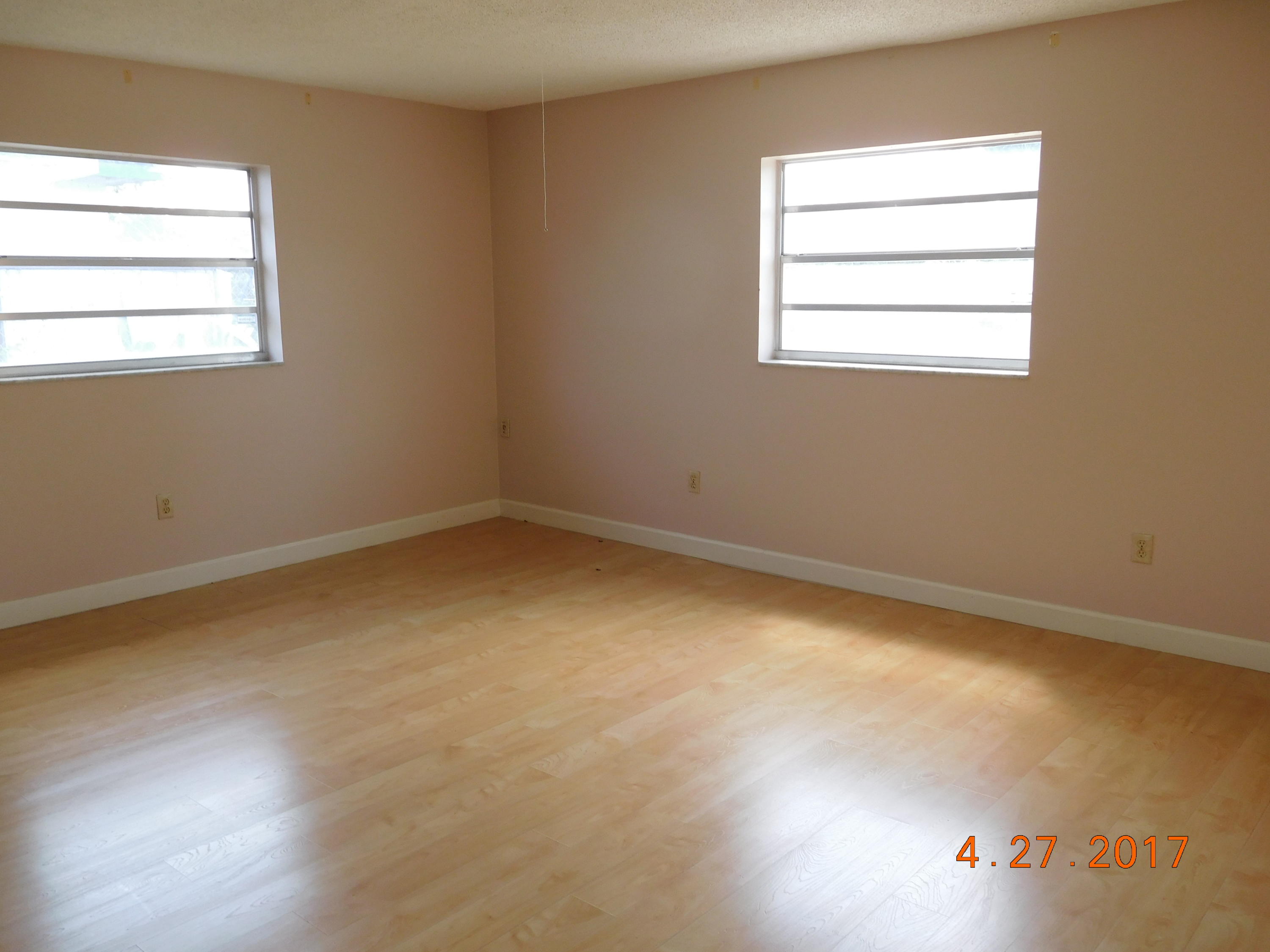 22367 Southwest 65th Avenue Boca Raton, FL 33428 - Photo 6 of 13 an empty room with a window