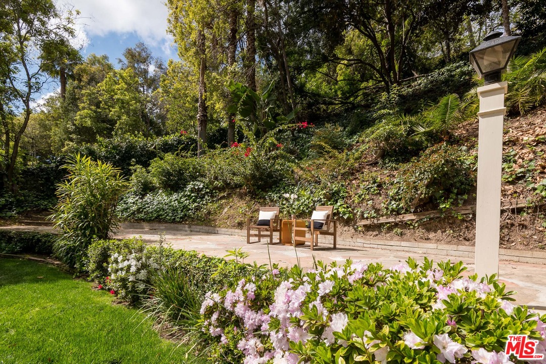 10886 Chalon Road Los Angeles, CA 90077 - Photo 3 of 33 a view of yard with flower plants