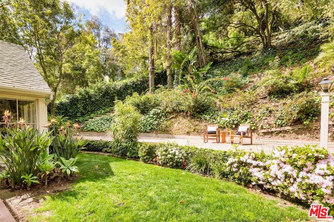 10886 Chalon Road Los Angeles, CA 90077 - Photo 26 of 33 a view of yard with green space