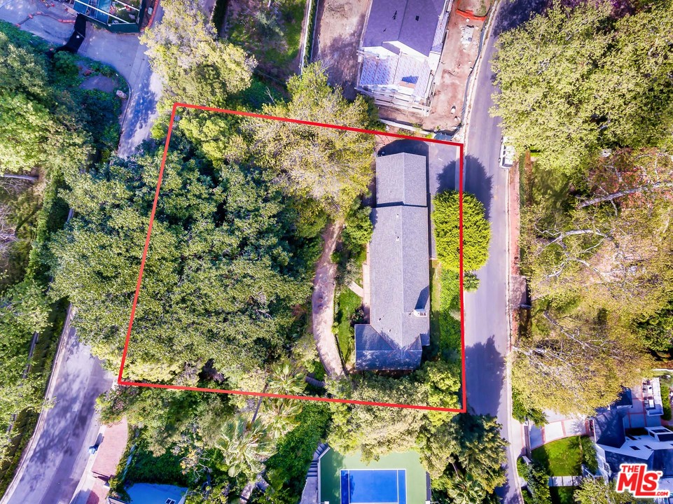 10886 Chalon Road Los Angeles, CA 90077 - Photo 32 of 33 an aerial view of residential house with outdoor space and trees