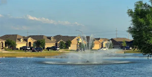 a view of yard with cars