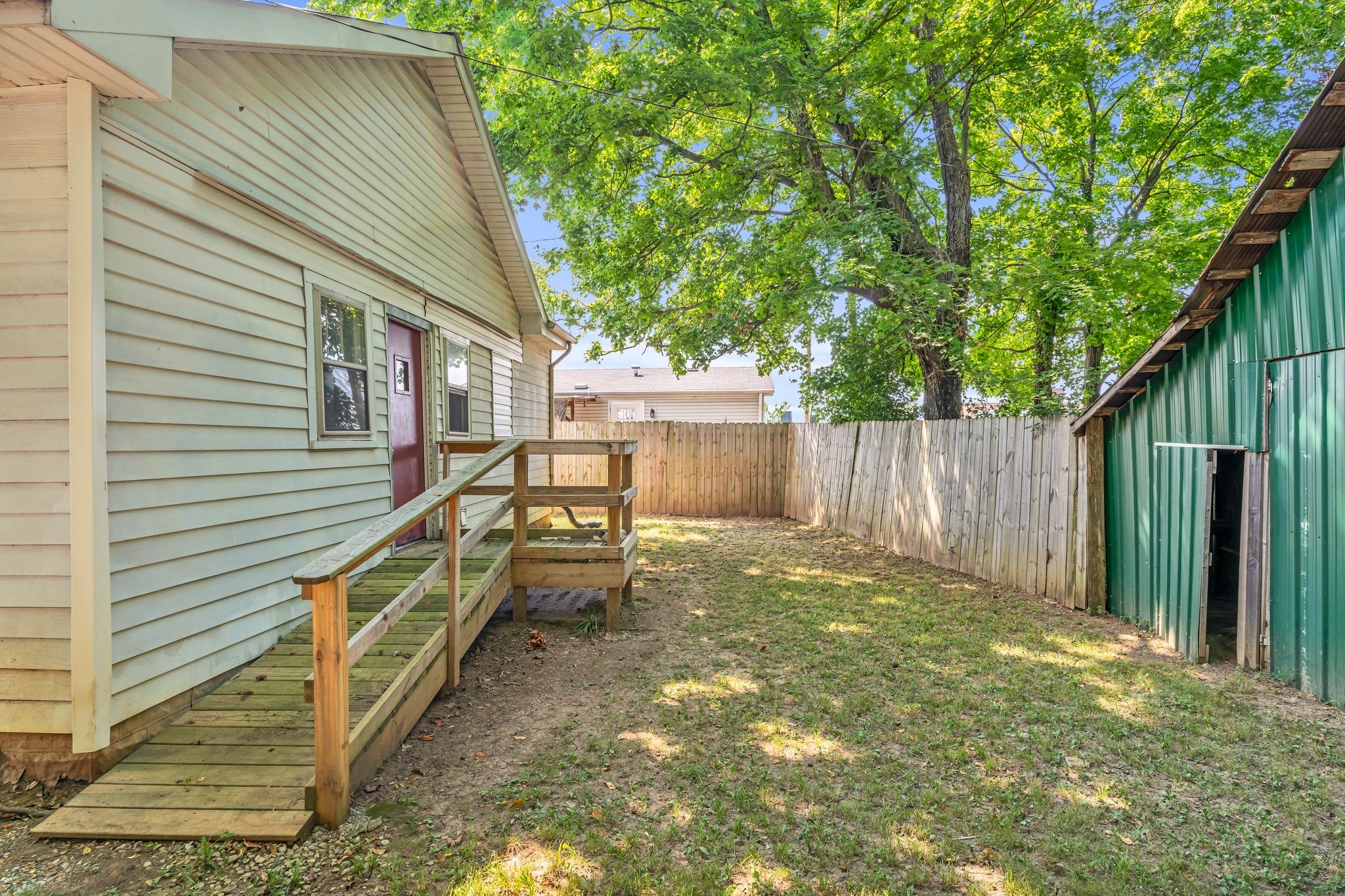514 East 8th Avenue Springfield, TN 37172 - Photo 24 of 29 a backyard of a house with table and chairs