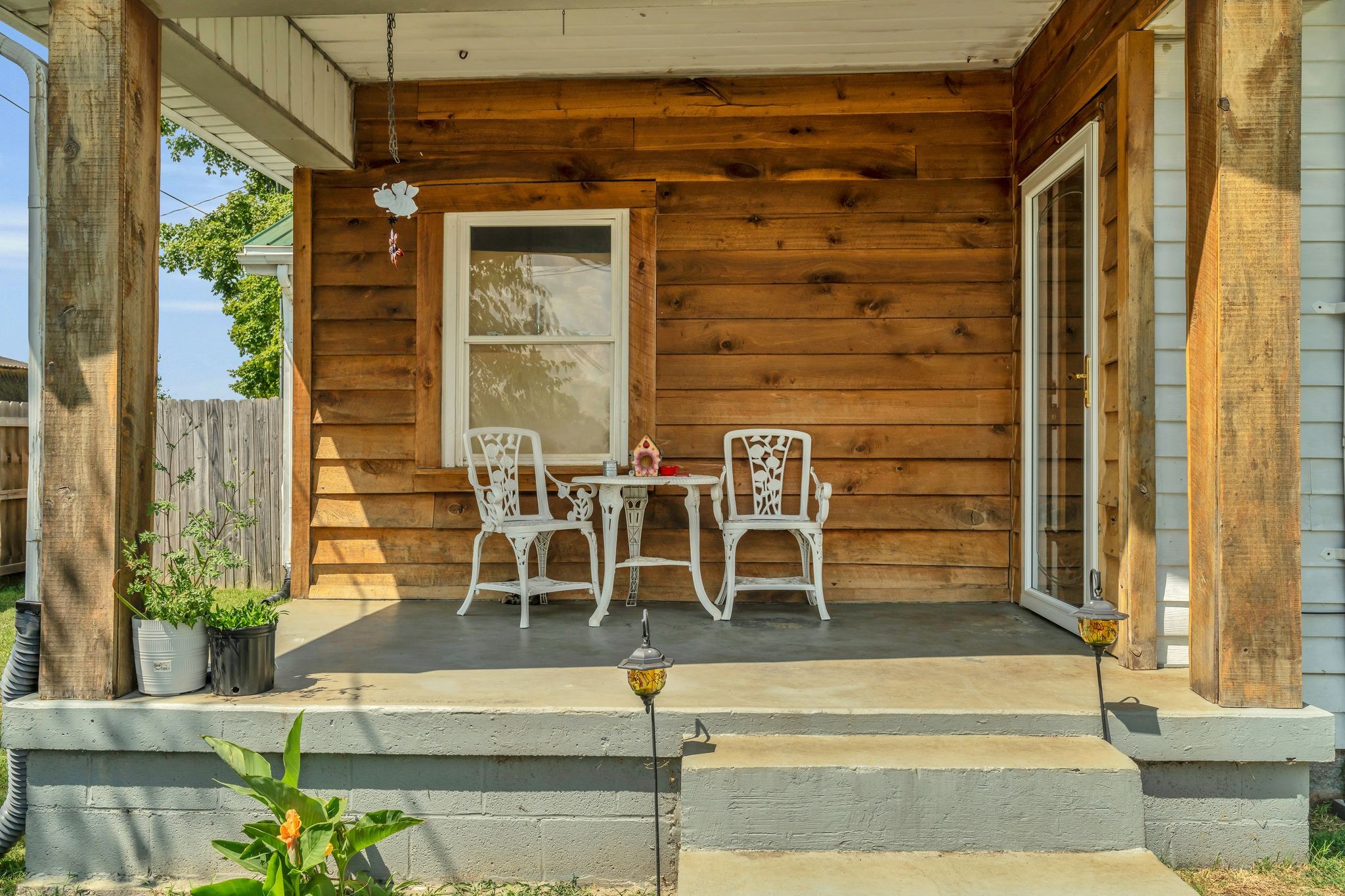 514 East 8th Avenue Springfield, TN 37172 - Photo 5 of 29 a building outdoor space with patio entrance and potted plants