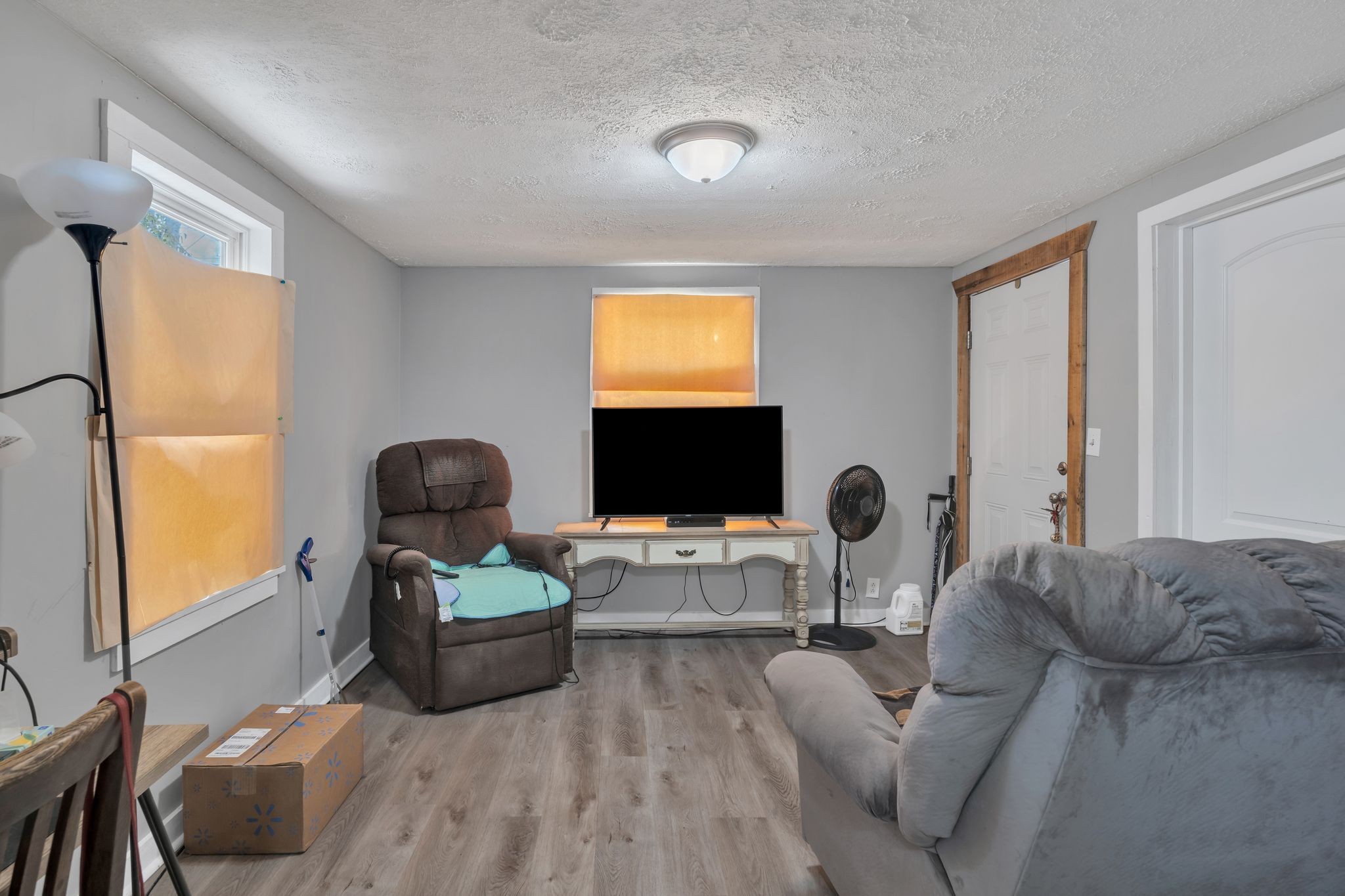 514 East 8th Avenue Springfield, TN 37172 - Photo 7 of 29 a living room with furniture a window and a flat screen tv