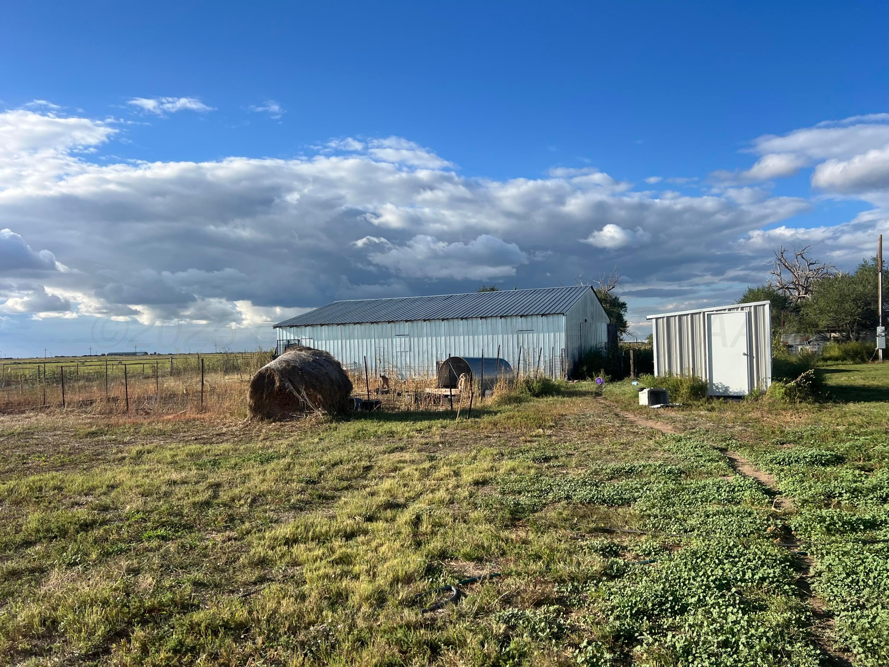 8269 County Road North Pampa, TX 79065 - Photo 19 of 21 a view of a house with backyard