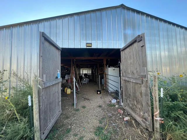 a view of a storage room with wooden stairs
