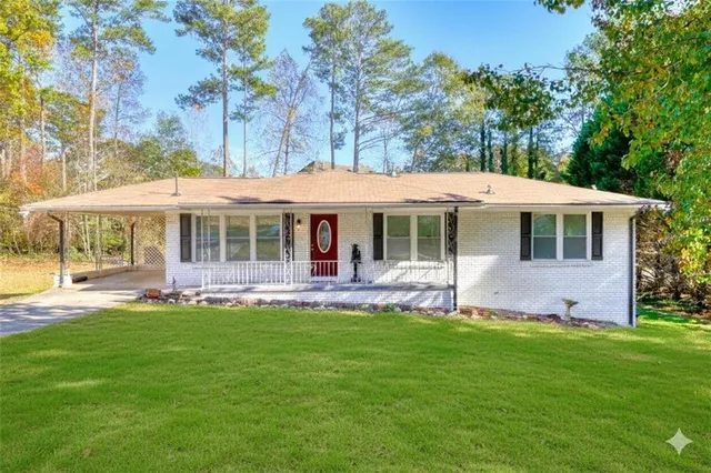 front view of a house with a yard