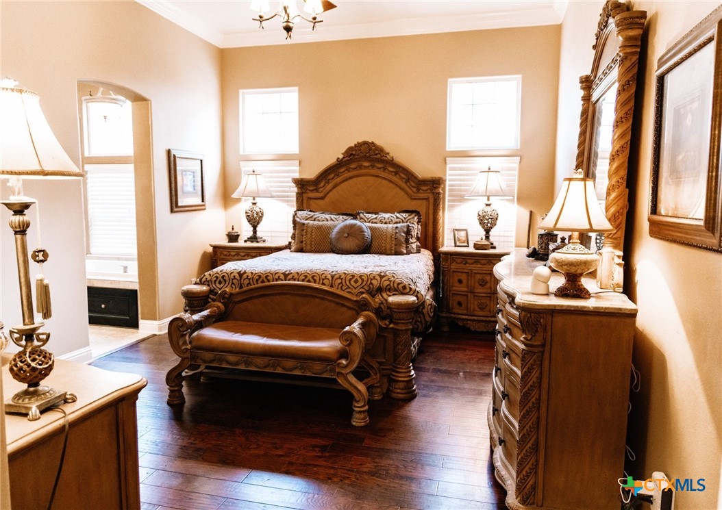 447 Schaefer Road Victoria, TX 77905 - Photo 14 of 25 a bedroom with a bed furniture and a window