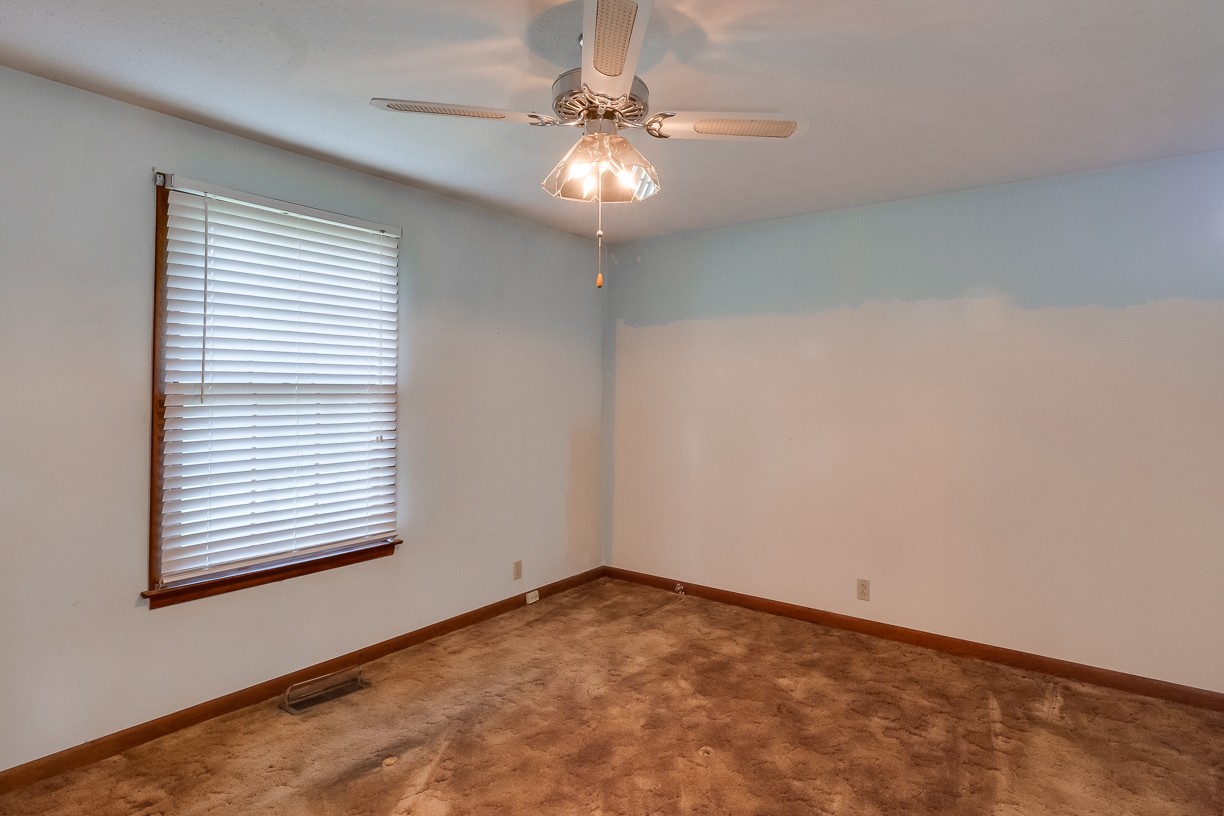 116 Green Acres Road Cottontown, TN 37048 - Photo 14 of 44 a view of an empty room with a window