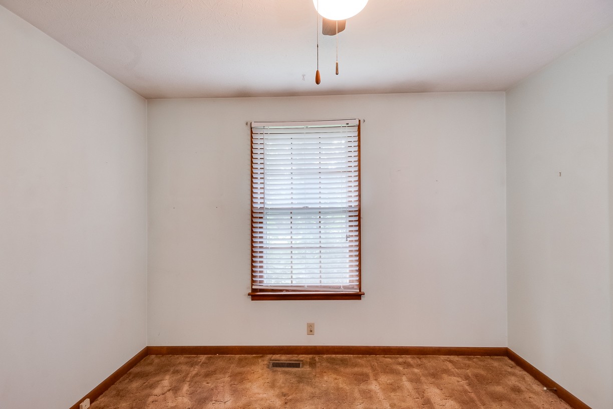 116 Green Acres Road Cottontown, TN 37048 - Photo 17 of 44 a view of an empty room with a window