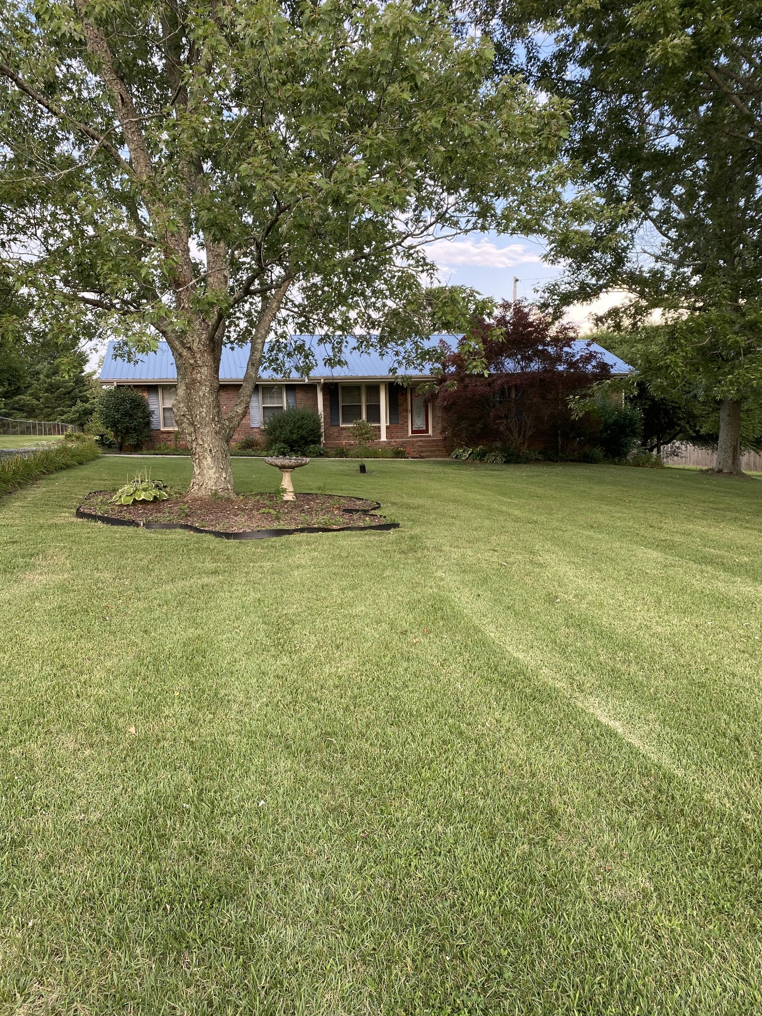 116 Green Acres Road Cottontown, TN 37048 - Photo 3 of 44 a view of a house with a yard