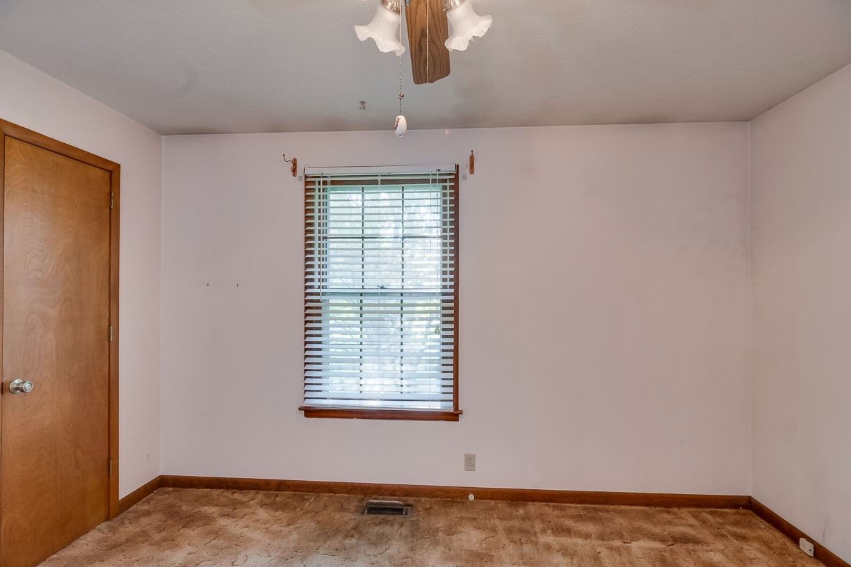 116 Green Acres Road Cottontown, TN 37048 - Photo 21 of 44 an empty room with a window