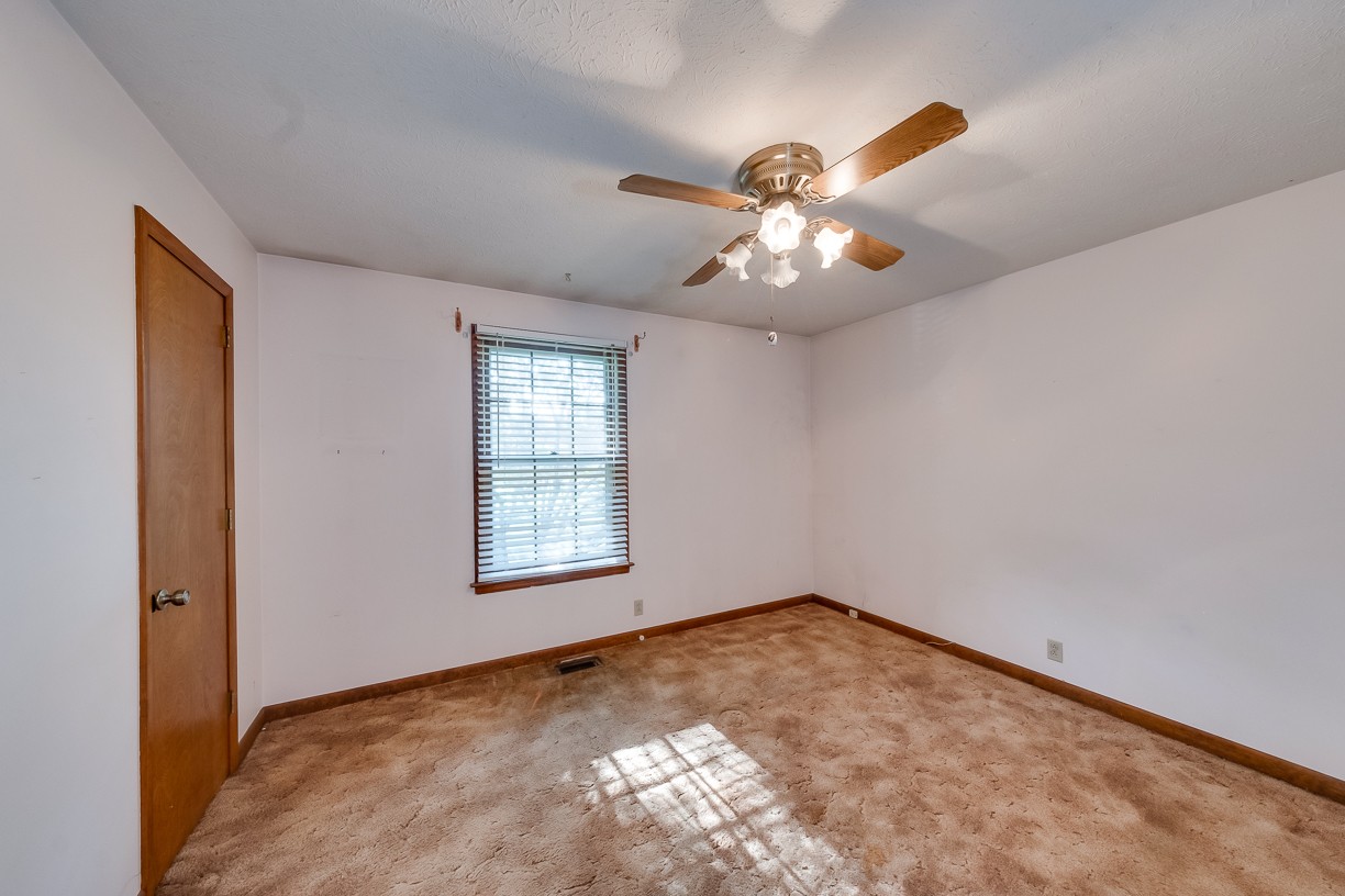 116 Green Acres Road Cottontown, TN 37048 - Photo 22 of 44 a view of empty room with windows