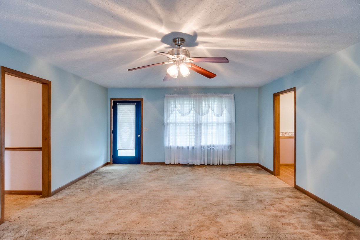 116 Green Acres Road Cottontown, TN 37048 - Photo 32 of 44 an empty room with fan and windows