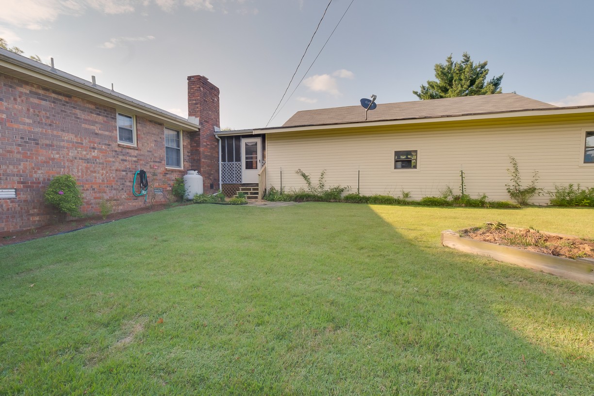 116 Green Acres Road Cottontown, TN 37048 - Photo 38 of 44 a view of a backyard of the house