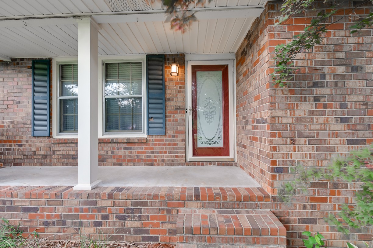 116 Green Acres Road Cottontown, TN 37048 - Photo 10 of 44 a view of entrance door of the house