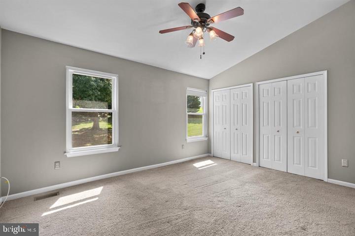 1163 Kelfield Drive, Unit 1163 Baltimore, MD 21227 - Photo 17 of 28 a view of an empty room with a window