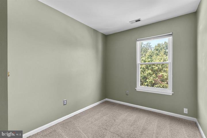 1163 Kelfield Drive, Unit 1163 Baltimore, MD 21227 - Photo 20 of 28 an empty room with a window