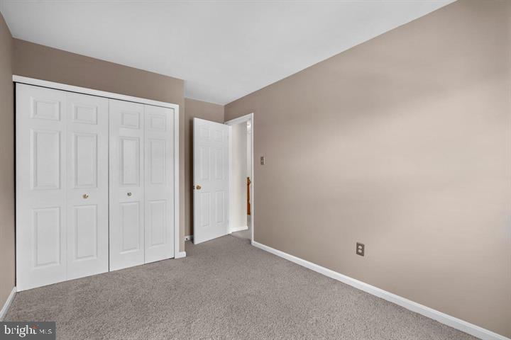 1163 Kelfield Drive, Unit 1163 Baltimore, MD 21227 - Photo 24 of 28 a view of an empty room