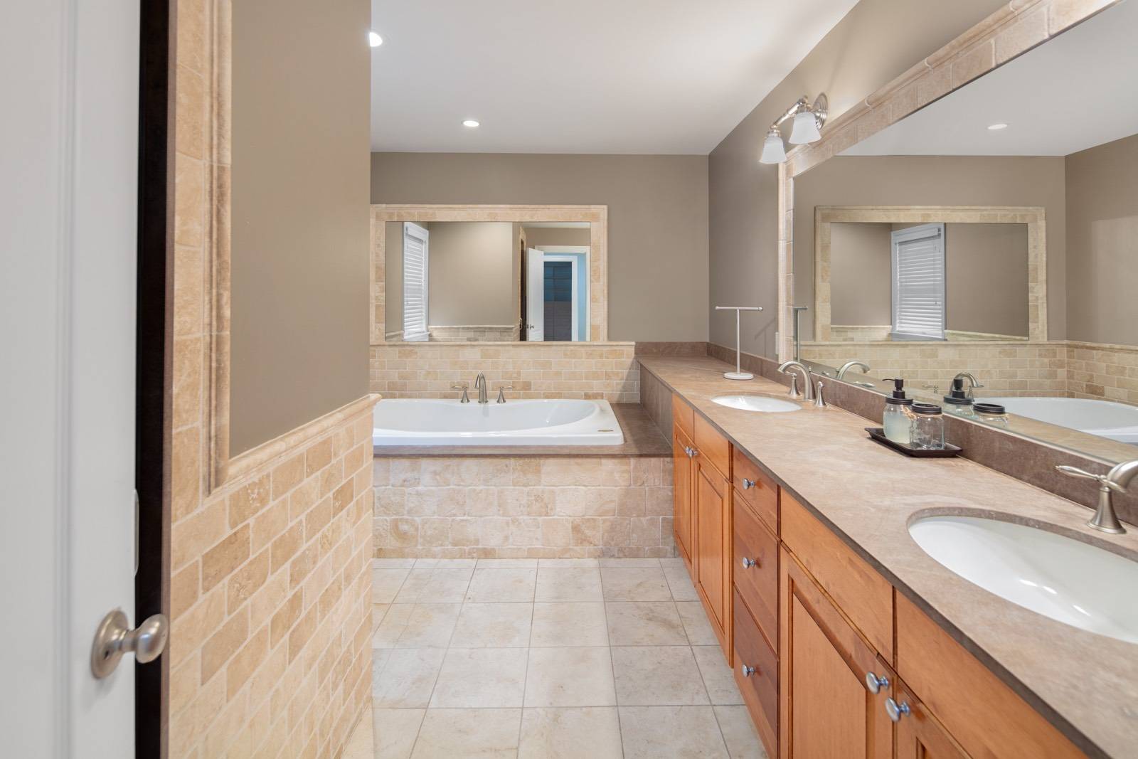 32 A Vail Avenue East Quogue, NY 11942 - Photo 11 of 24 a bathroom with sink double vanity and a mirror