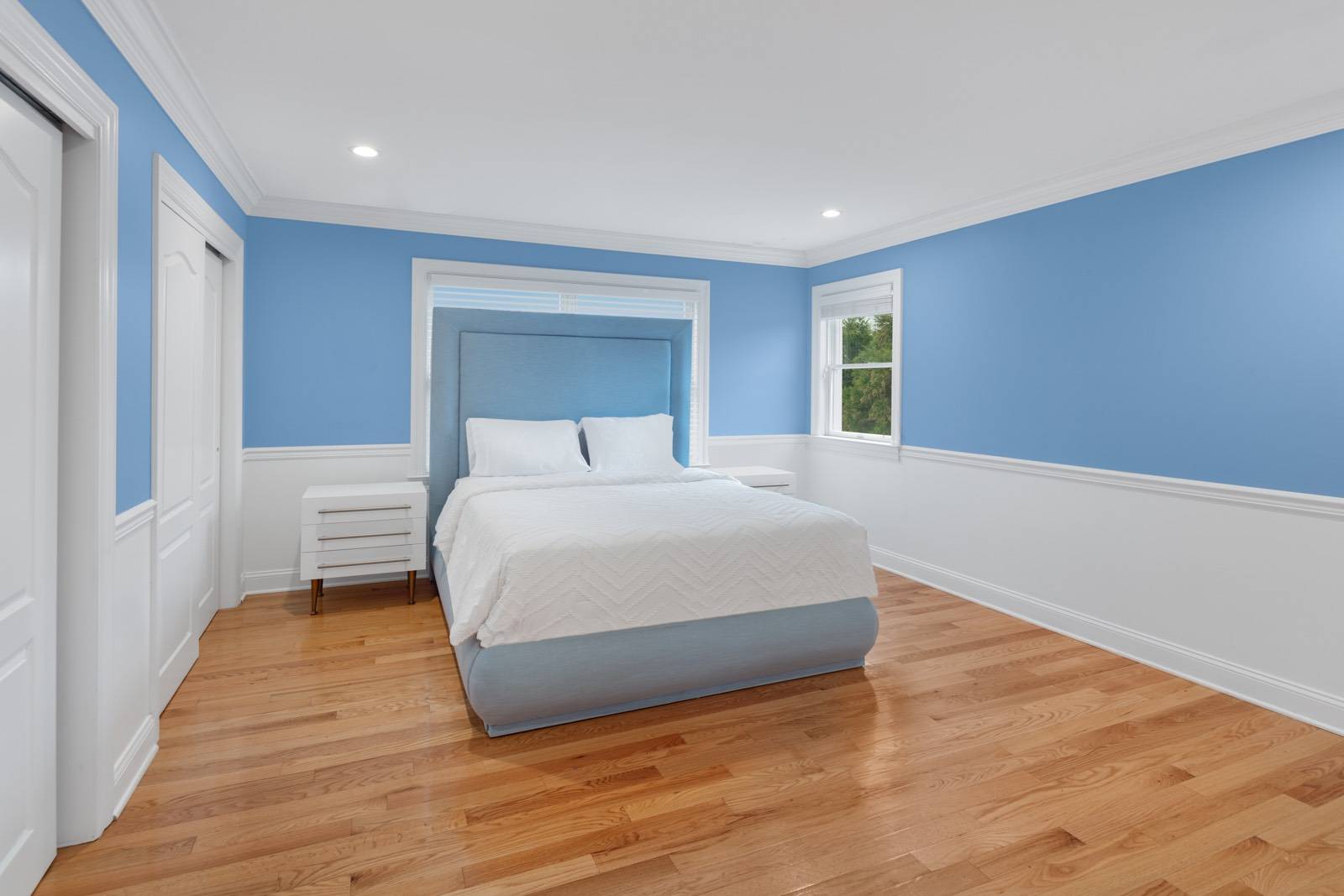 32 A Vail Avenue East Quogue, NY 11942 - Photo 12 of 24 a bedroom with a bed and a night stand