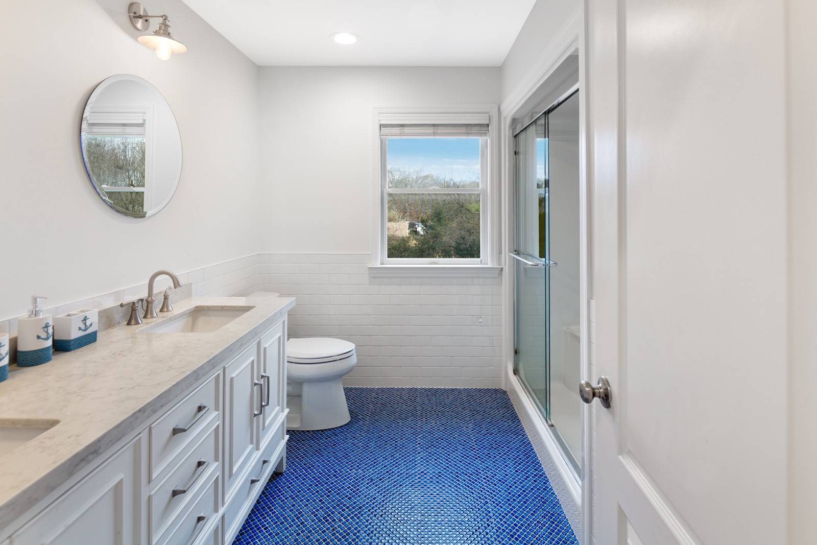 32 A Vail Avenue East Quogue, NY 11942 - Photo 16 of 24 a bathroom with a granite countertop sink mirror and a toilet