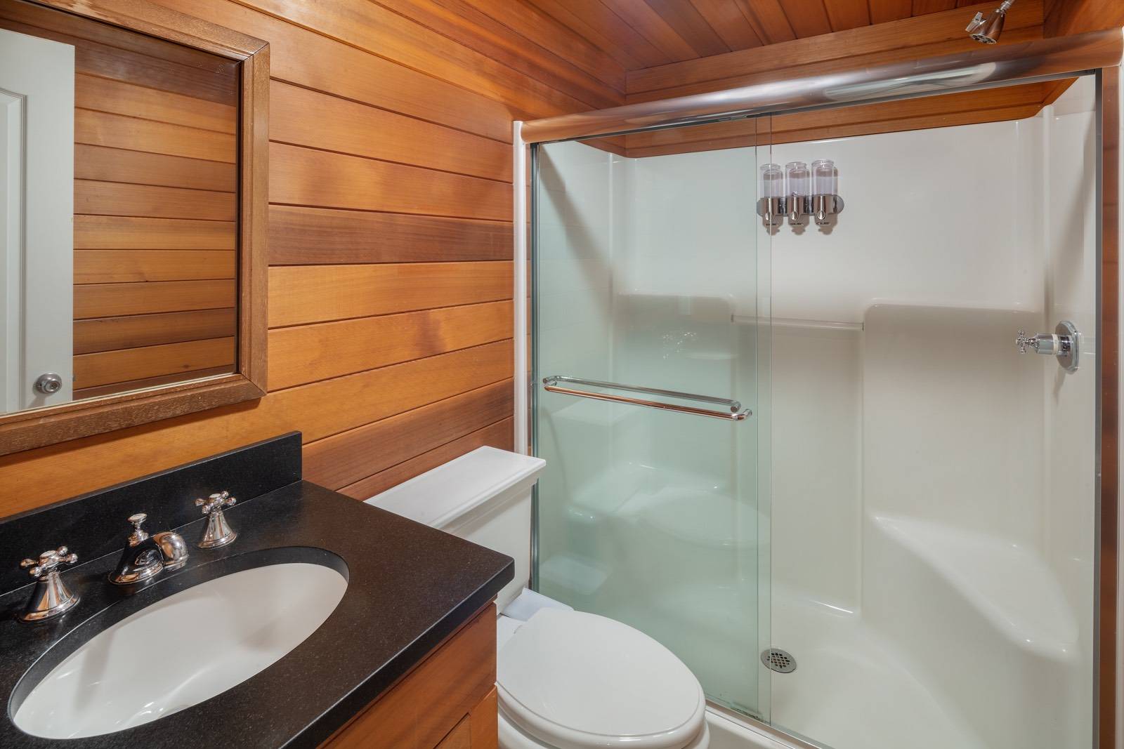 32 A Vail Avenue East Quogue, NY 11942 - Photo 23 of 24 a bathroom with a sink toilet and shower