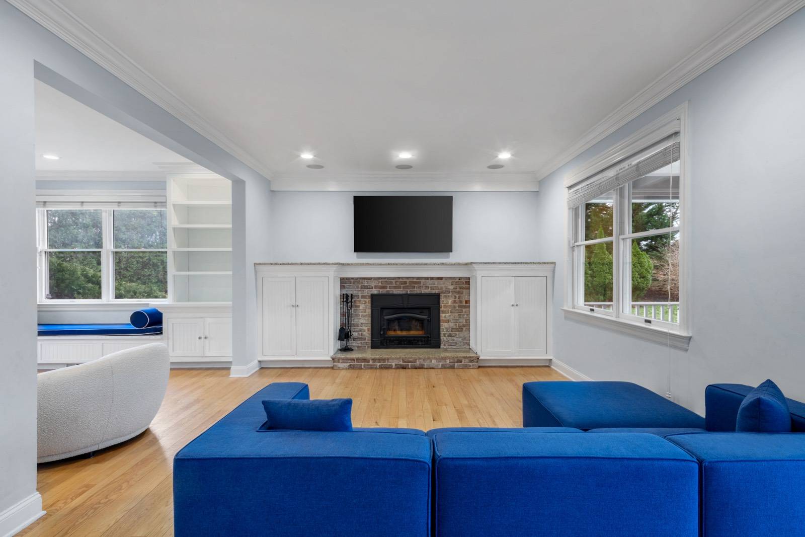 32 A Vail Avenue East Quogue, NY 11942 - Photo 4 of 24 a living room with furniture fireplace and window