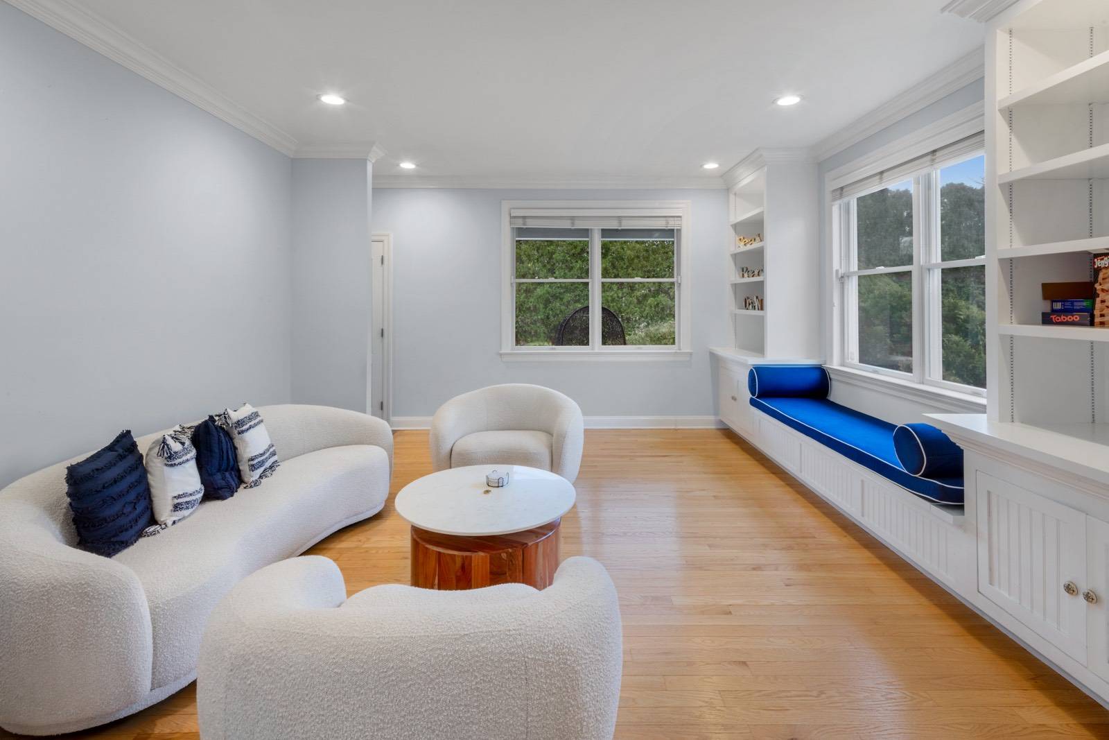 32 A Vail Avenue East Quogue, NY 11942 - Photo 5 of 24 a living room with furniture and a large window