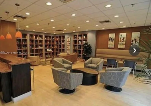 a large room with gym equipment