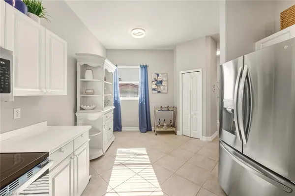 $469,999 | 8063 Sanctuary Drive, Unit 1, Naples, FL 34104