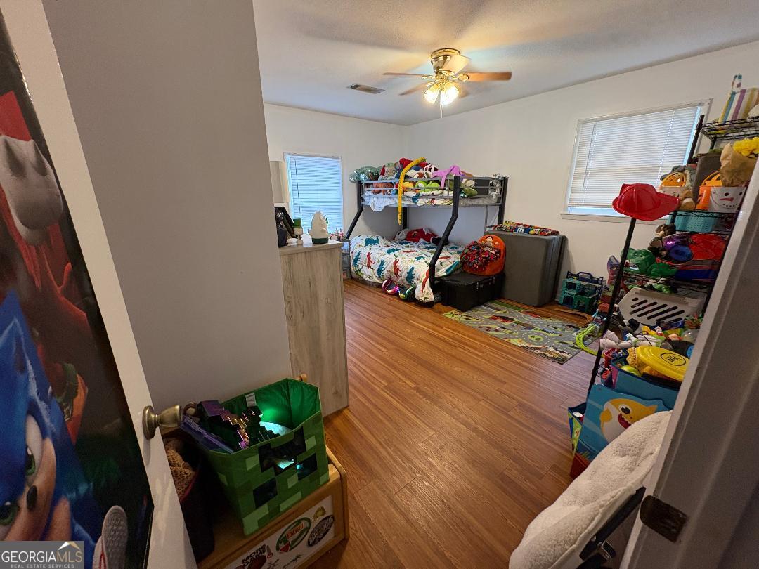 2103 Aimwell Road Vidalia, GA 30474 - Photo 16 of 22 a view of a entryway with furniture and toys