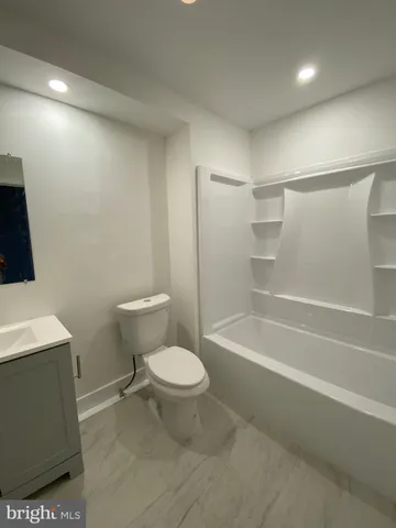 an empty room with a windows