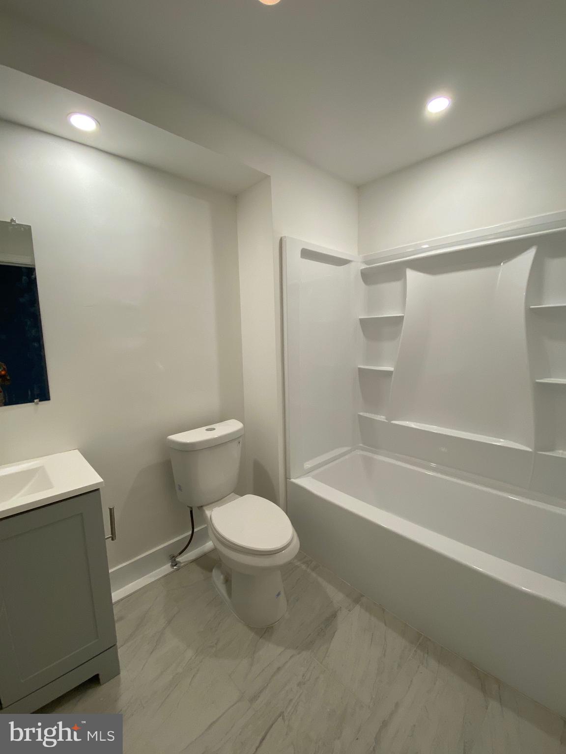 45 East High Street, Unit 2ND & 3 Pottstown, PA 19464 - Photo 27 of 34 a bathroom with a toilet a sink and bathtub