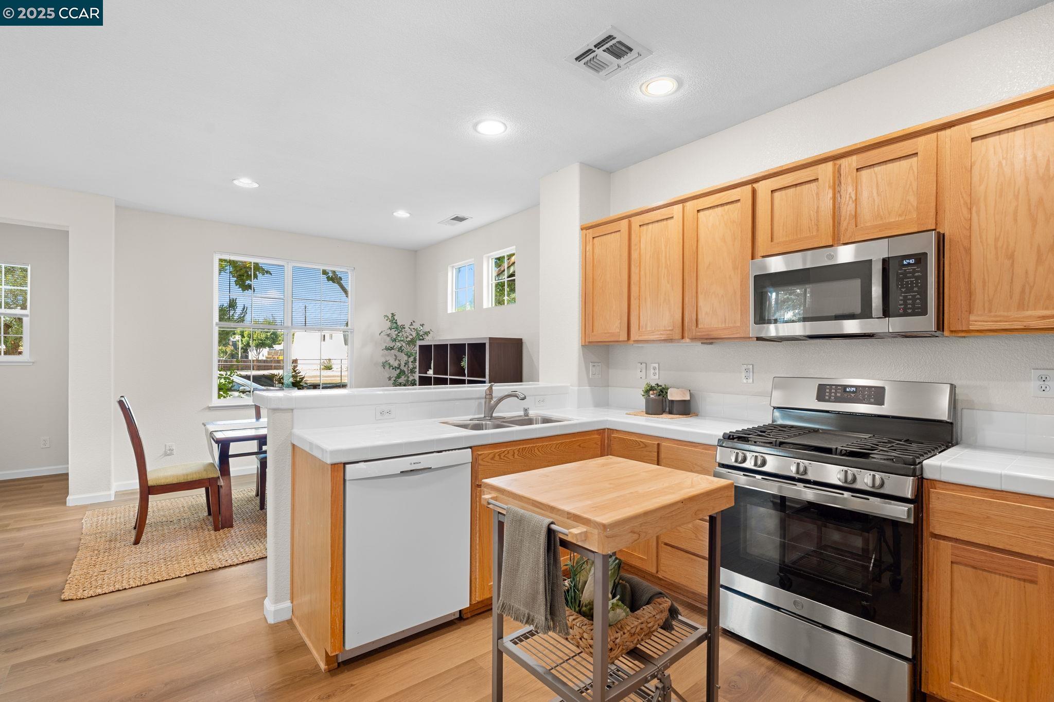 2805 Euclid Avenue Concord, CA 94519 - Photo 16 of 46 a kitchen with a stove a sink and a microwave