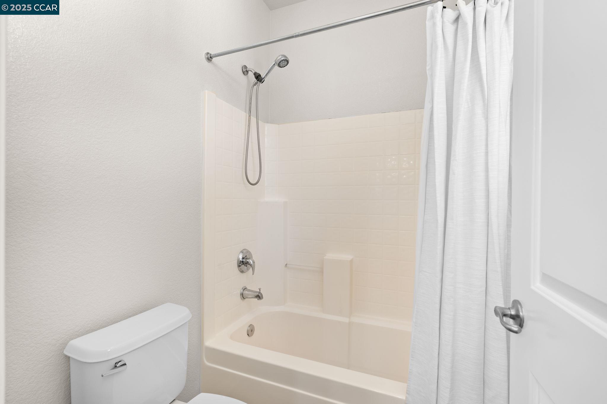 2805 Euclid Avenue Concord, CA 94519 - Photo 24 of 46 a bathroom with a shower and a toilet