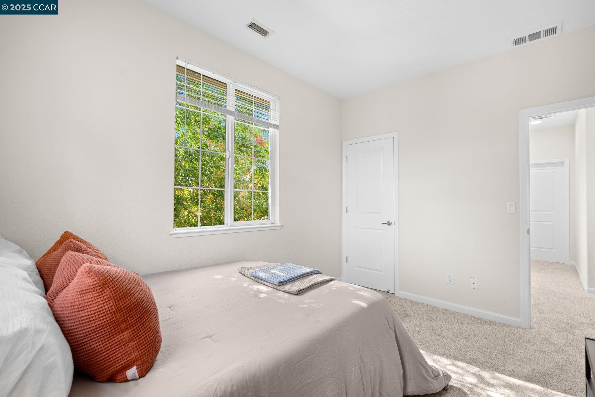2805 Euclid Avenue Concord, CA 94519 - Photo 28 of 46 a bedroom with a bed and a window