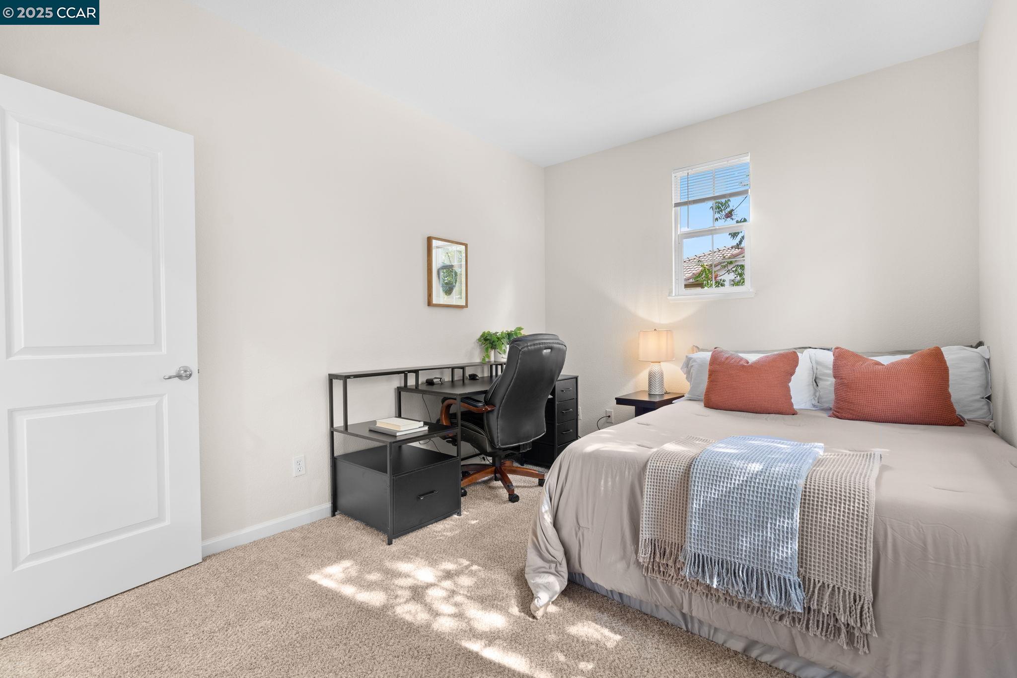 2805 Euclid Avenue Concord, CA 94519 - Photo 29 of 46 a bedroom with a bed a desk and chair