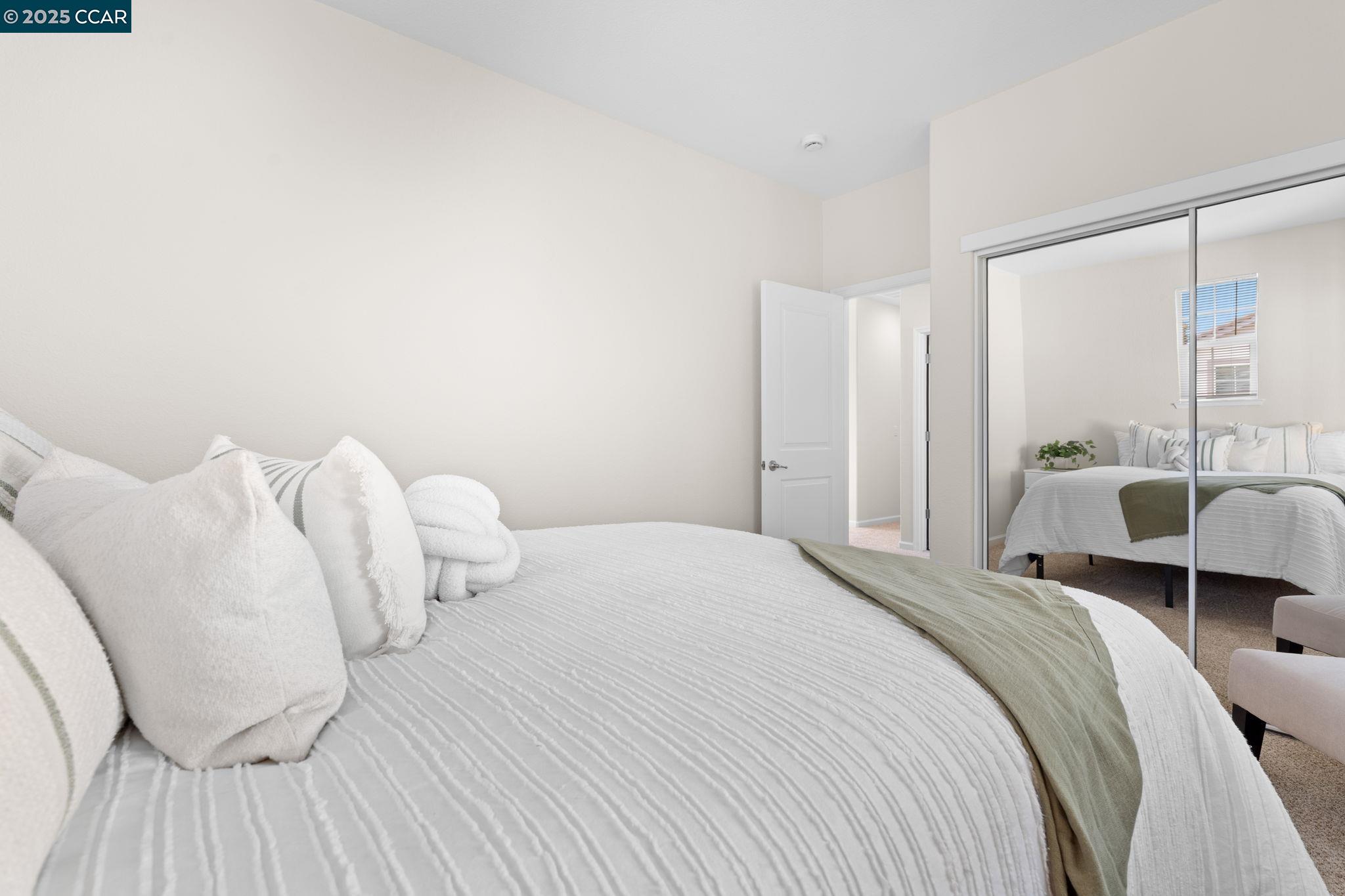 2805 Euclid Avenue Concord, CA 94519 - Photo 33 of 46 a bedroom with a bed and a large window