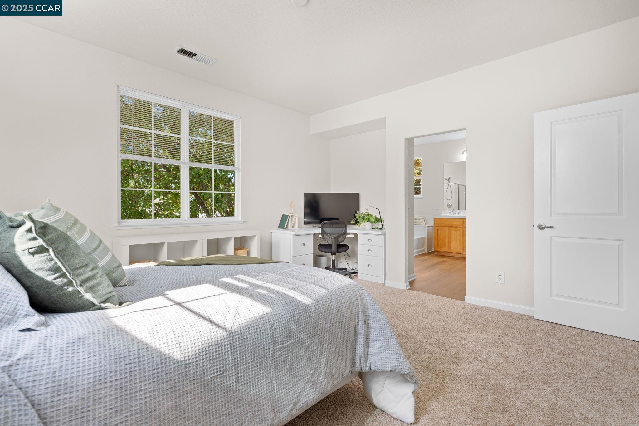 2805 Euclid Avenue Concord, CA 94519 - Photo 35 of 46 a bedroom with a bed and a flat screen tv