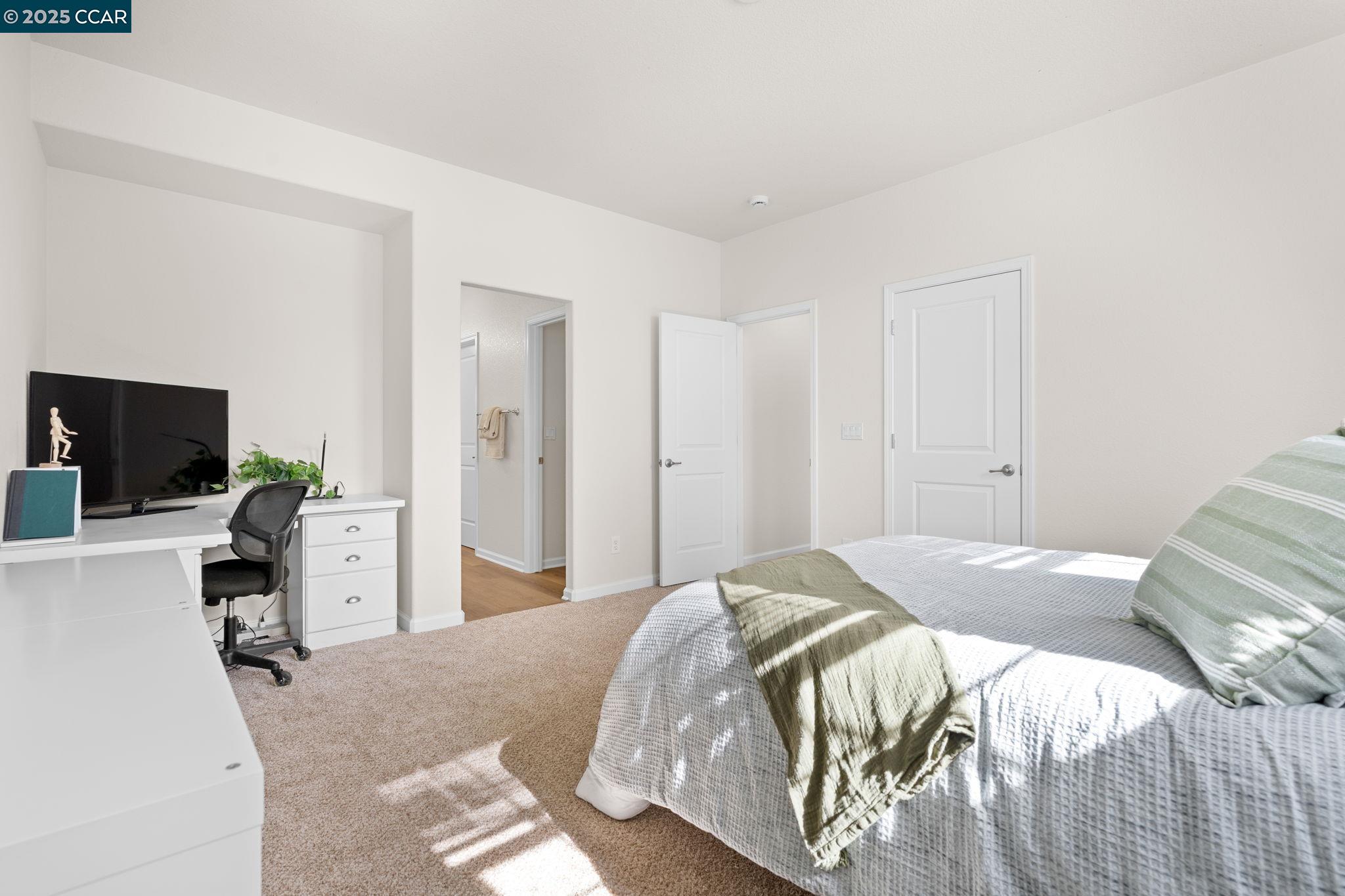 2805 Euclid Avenue Concord, CA 94519 - Photo 37 of 46 a bedroom with a bed and flat screen tv