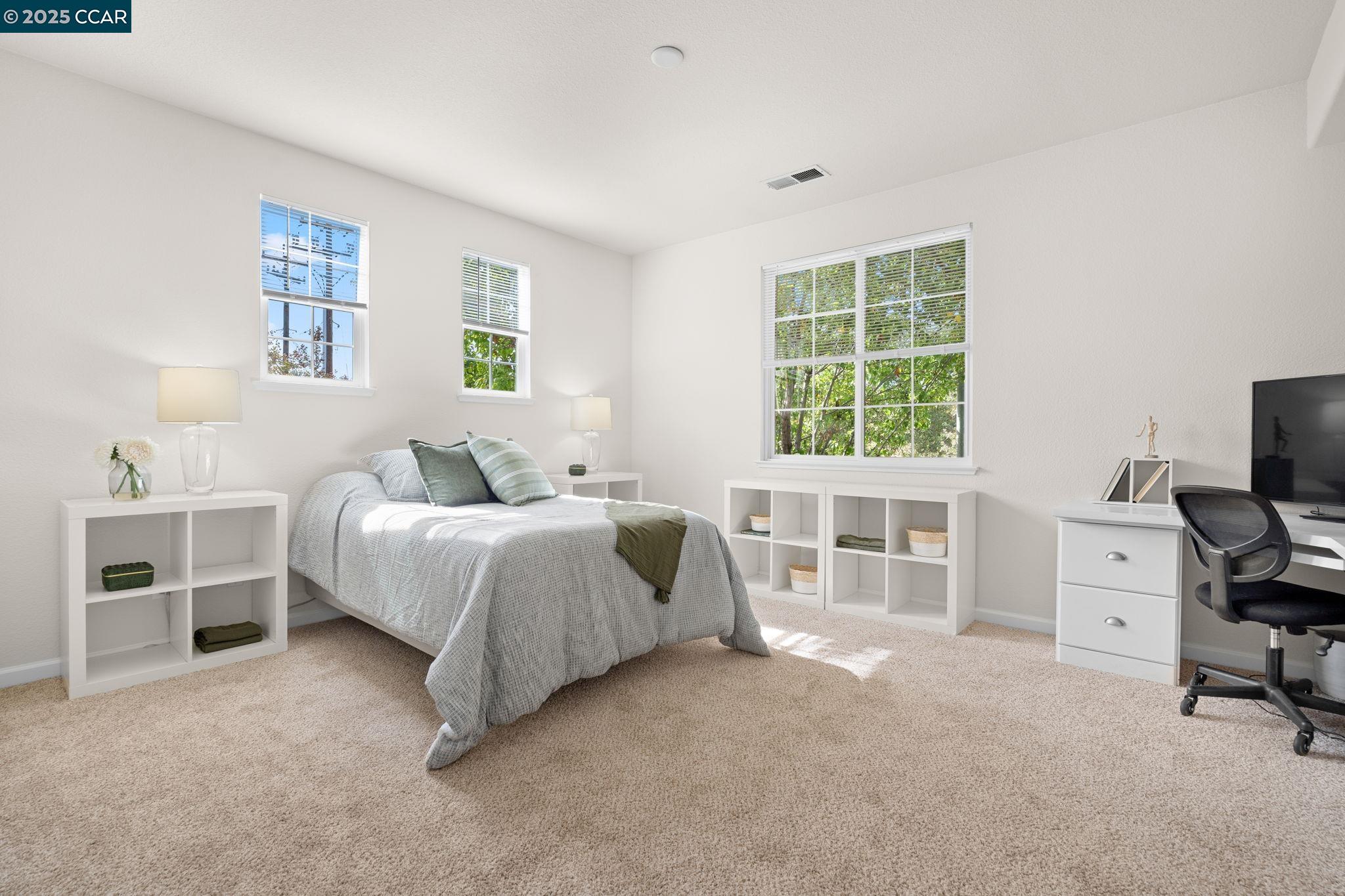 2805 Euclid Avenue Concord, CA 94519 - Photo 38 of 46 a spacious bedroom with a bed and a window