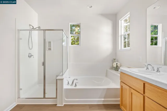 a bathroom with a bathtub and a sink