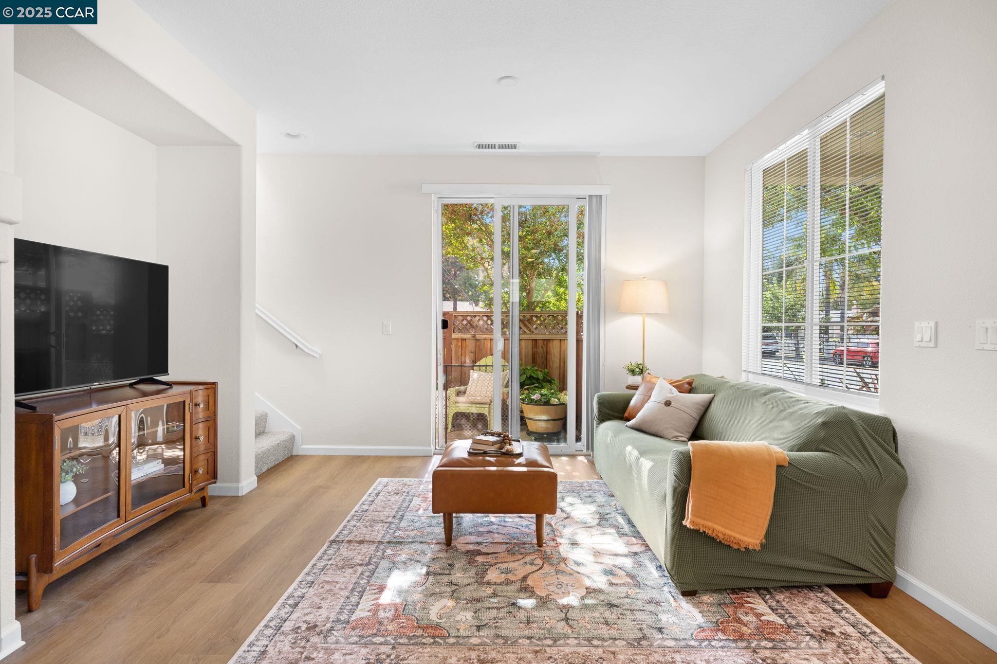 2805 Euclid Avenue Concord, CA 94519 - Photo 7 of 46 a living room with furniture and a flat screen tv
